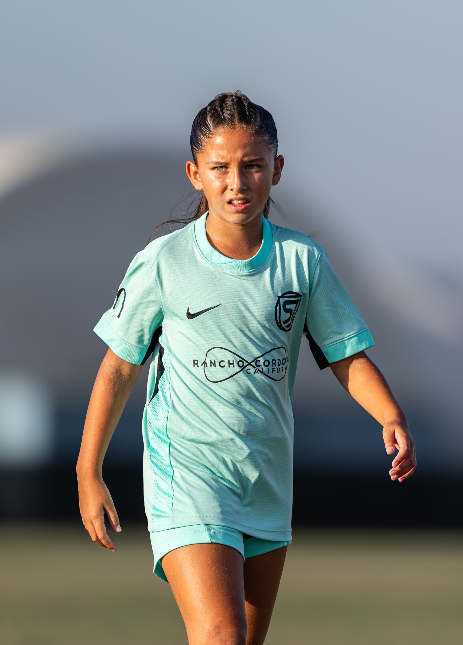 San Juan soccer player moving into position