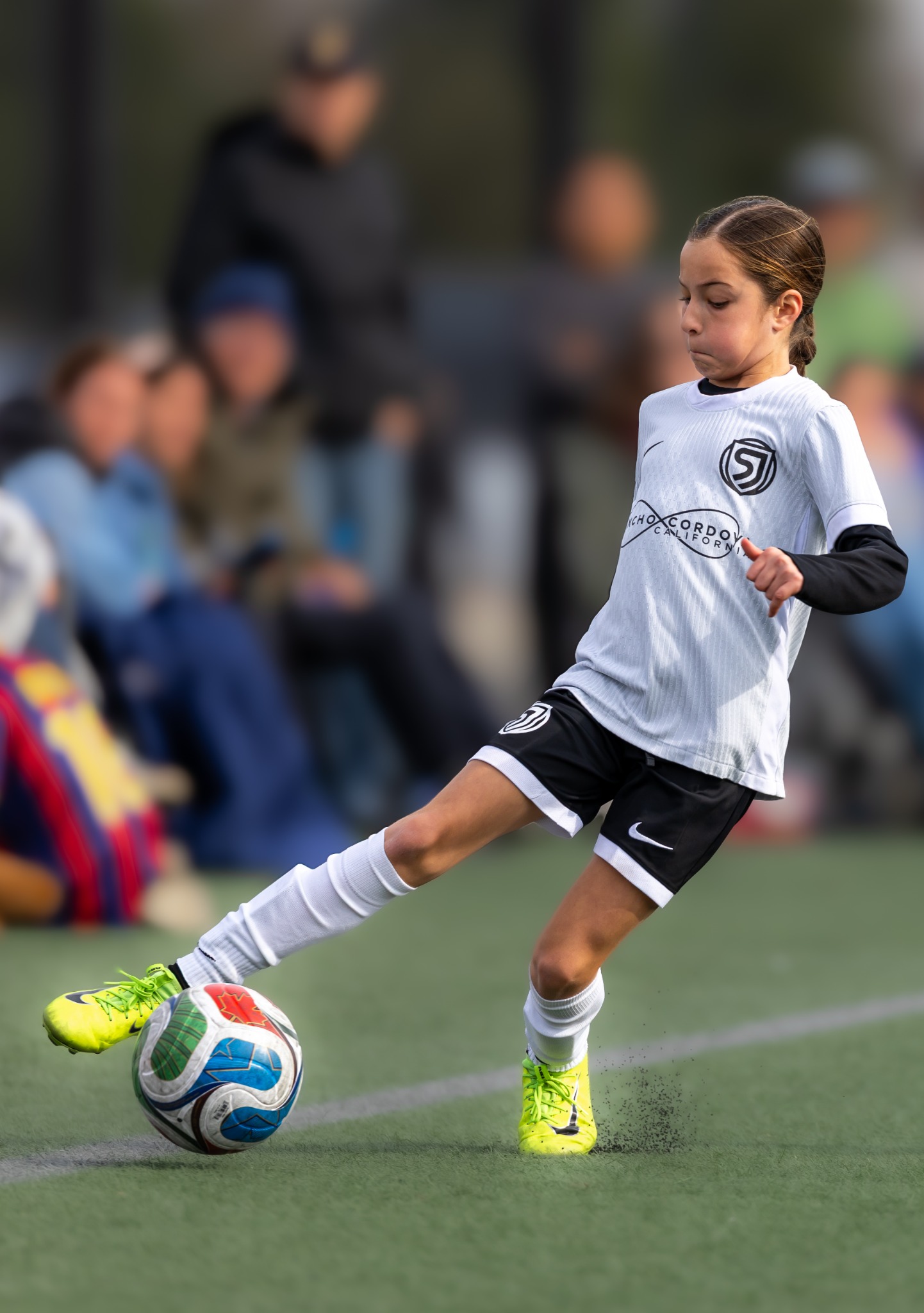 Youth soccer player controlling the ball