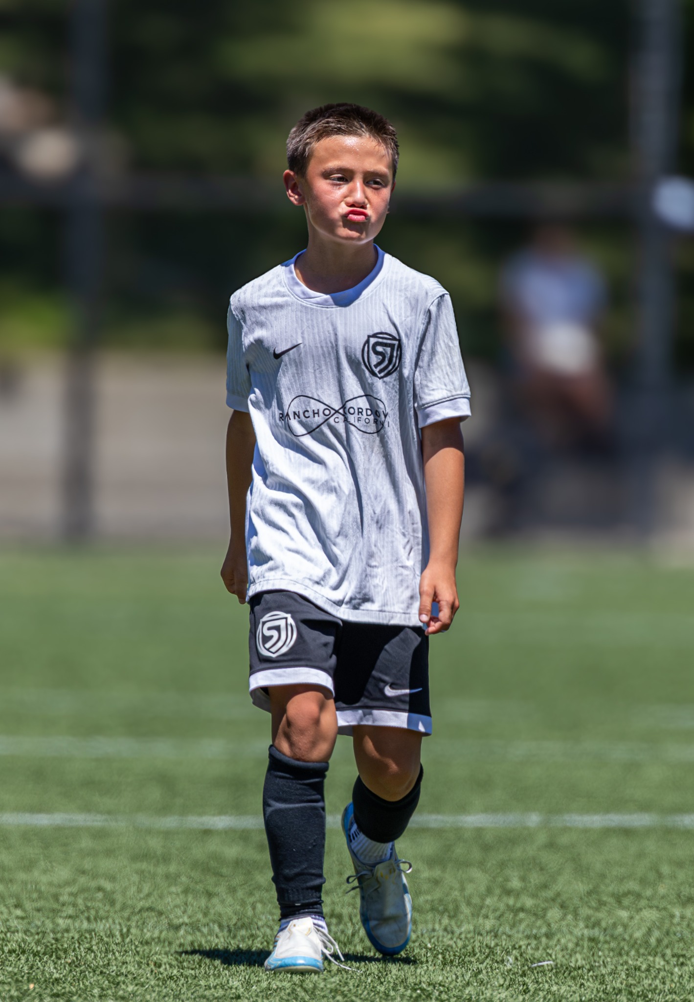San Juan youth soccer player between plays
