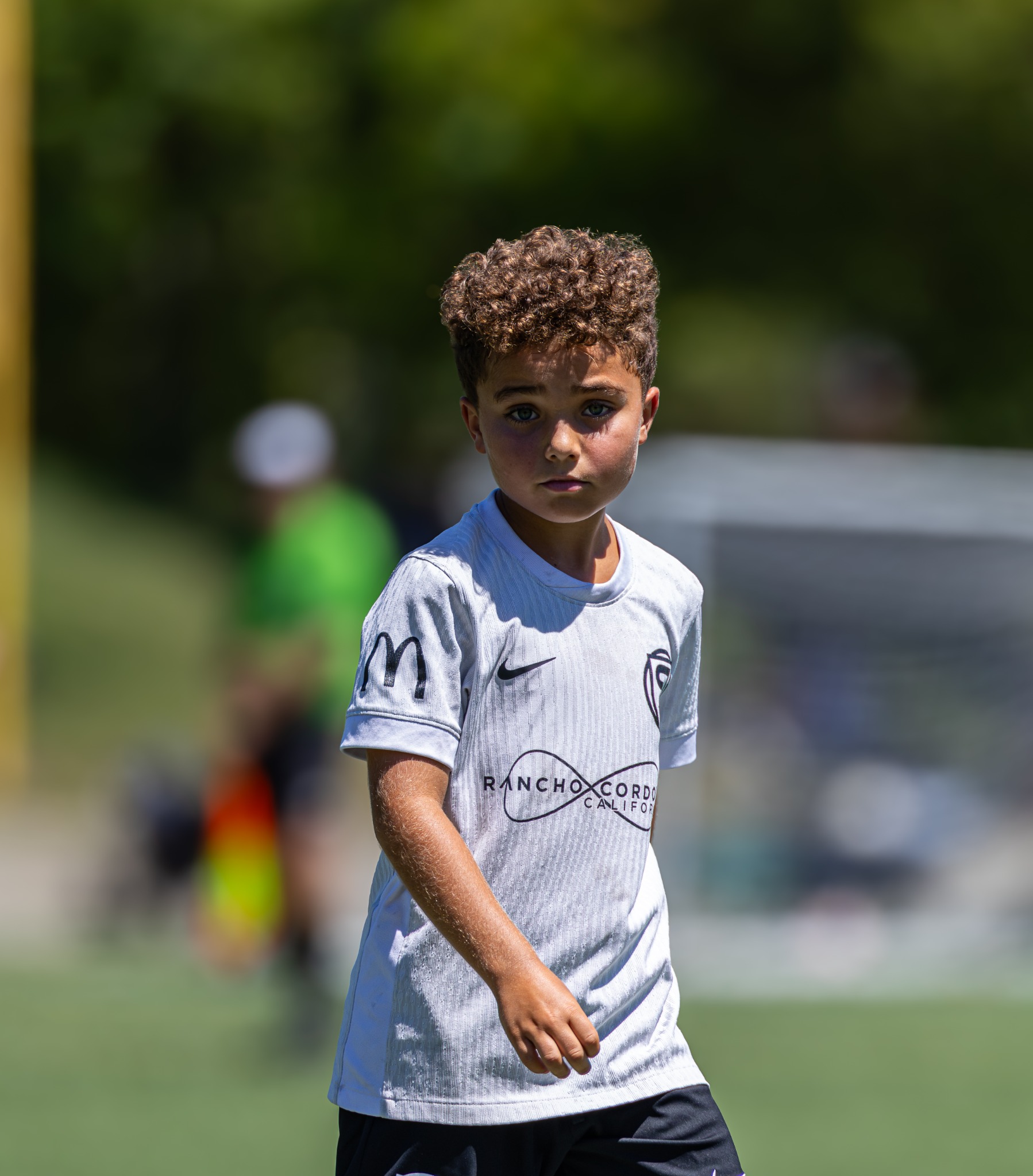 Youth soccer player looking toward the camera